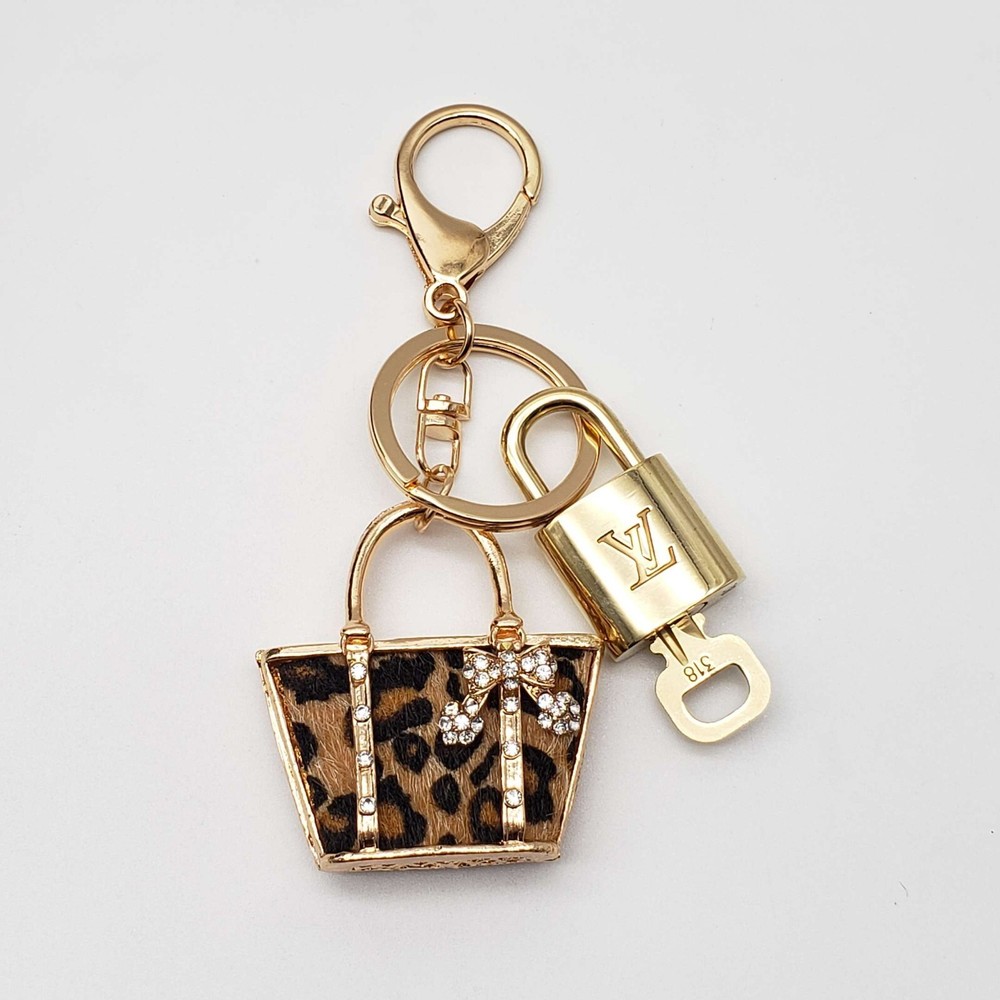 100% Auth Louis Vuitton Lock & Key with unbranded Bagcharm, Keycharm, Keychain