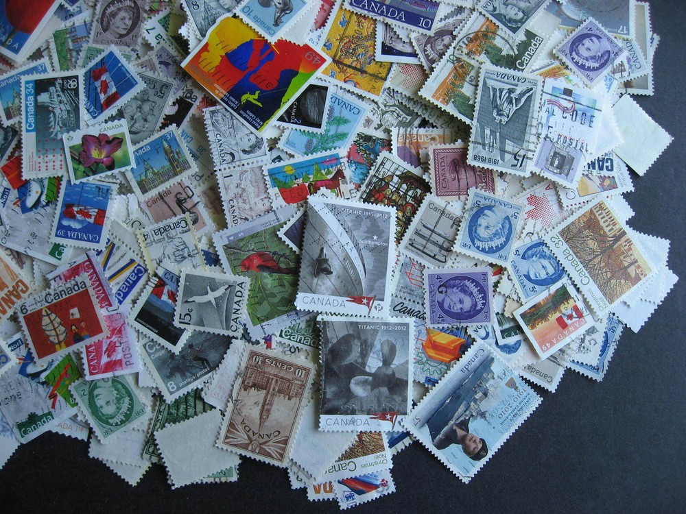 Canada colossal mixture (duplicates,mixed cond) 1000 laid out35%comems,65%defins