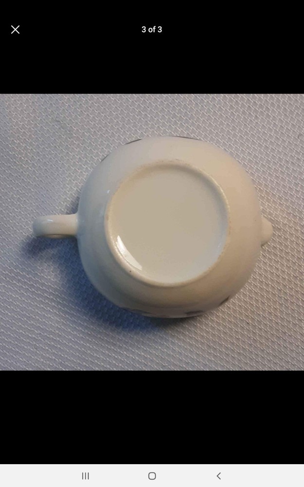 Cranberry ceramic creamer