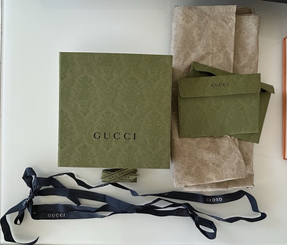 empty designer boxes - Chanel, Gucci, And Louis Vuitton. Various sizes