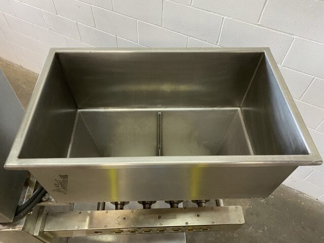 R.F. Auger Depositor