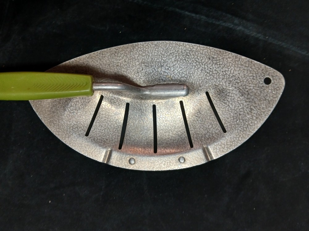 Vintage pot strainer