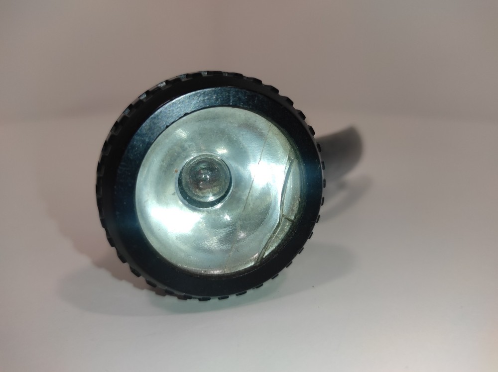 Soviet electrodynamic flashlight called "Zhuchok." "B-44."