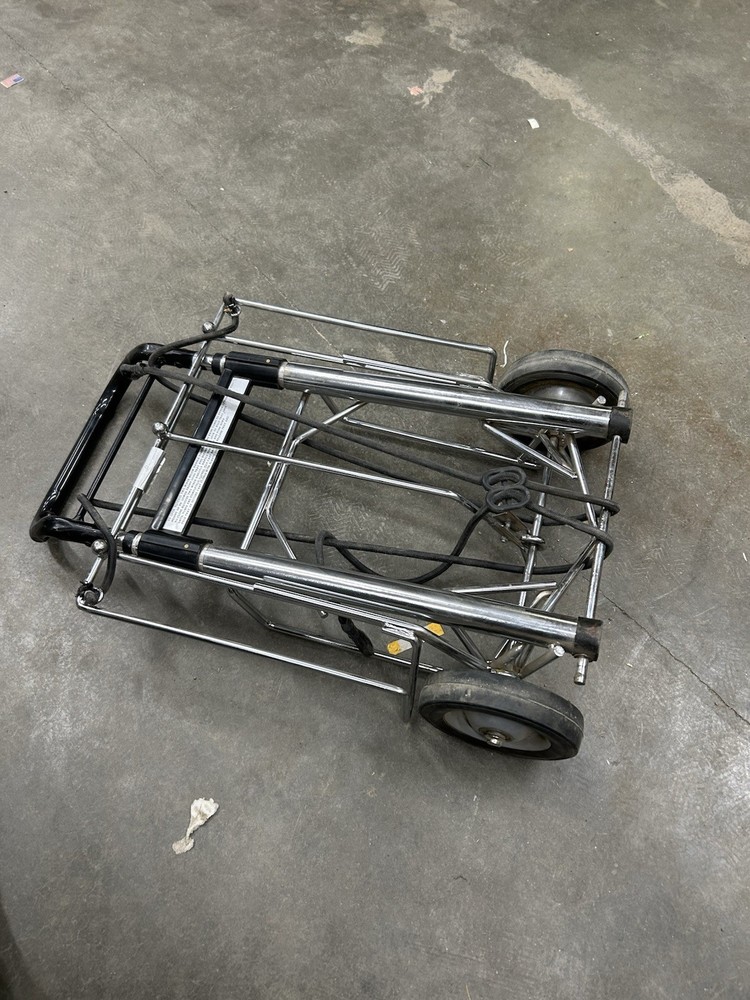 Clipper Folding Hand Truck/Tool Dolly. With Built In Bungee Straps, Solid Wheels