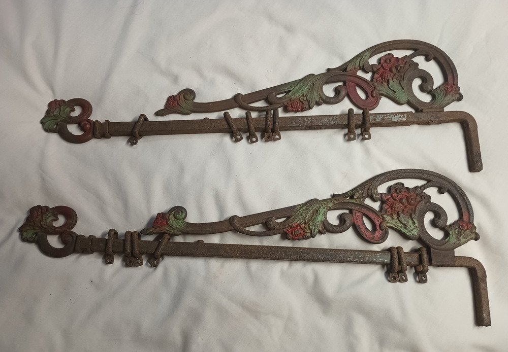 ANTIQUE CAST IRON SWING ARM DRAPERY HANGERS ,SET OF 2  - FLOWER DESIGN