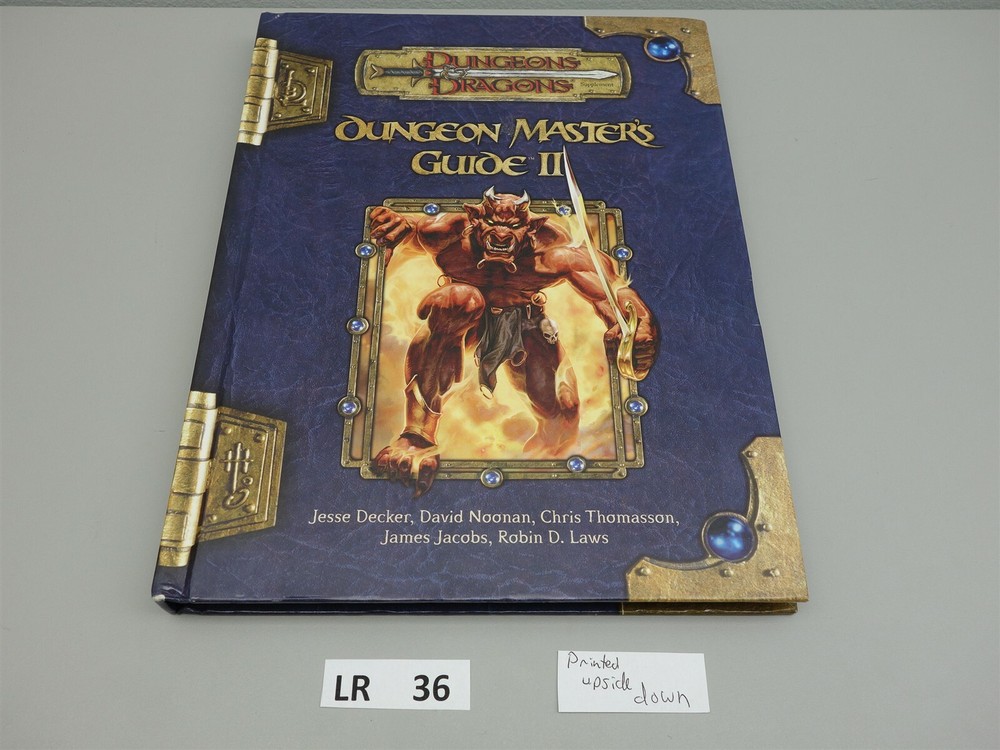 Dungeons & Dragons, D&D: Dungeon Master's Guide II - bound upside down