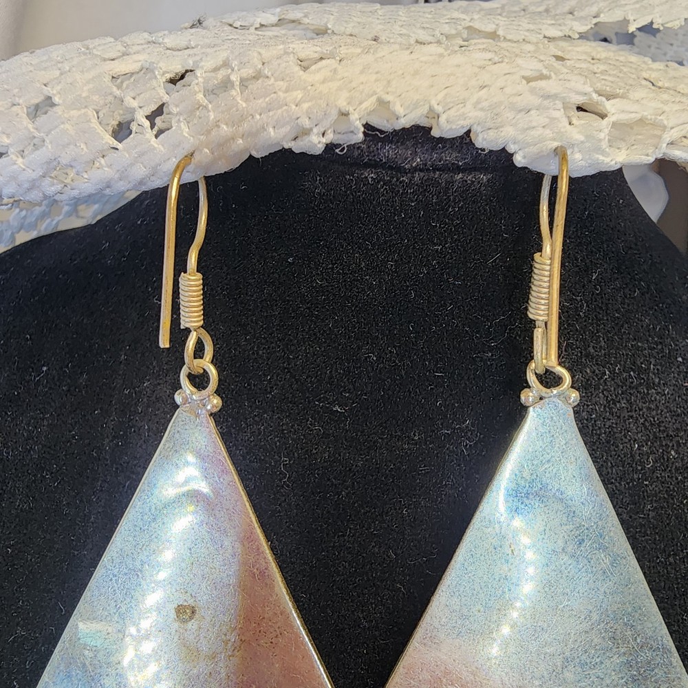 Triangle-shaped dangle earrings featuring mosaic-style turquoise