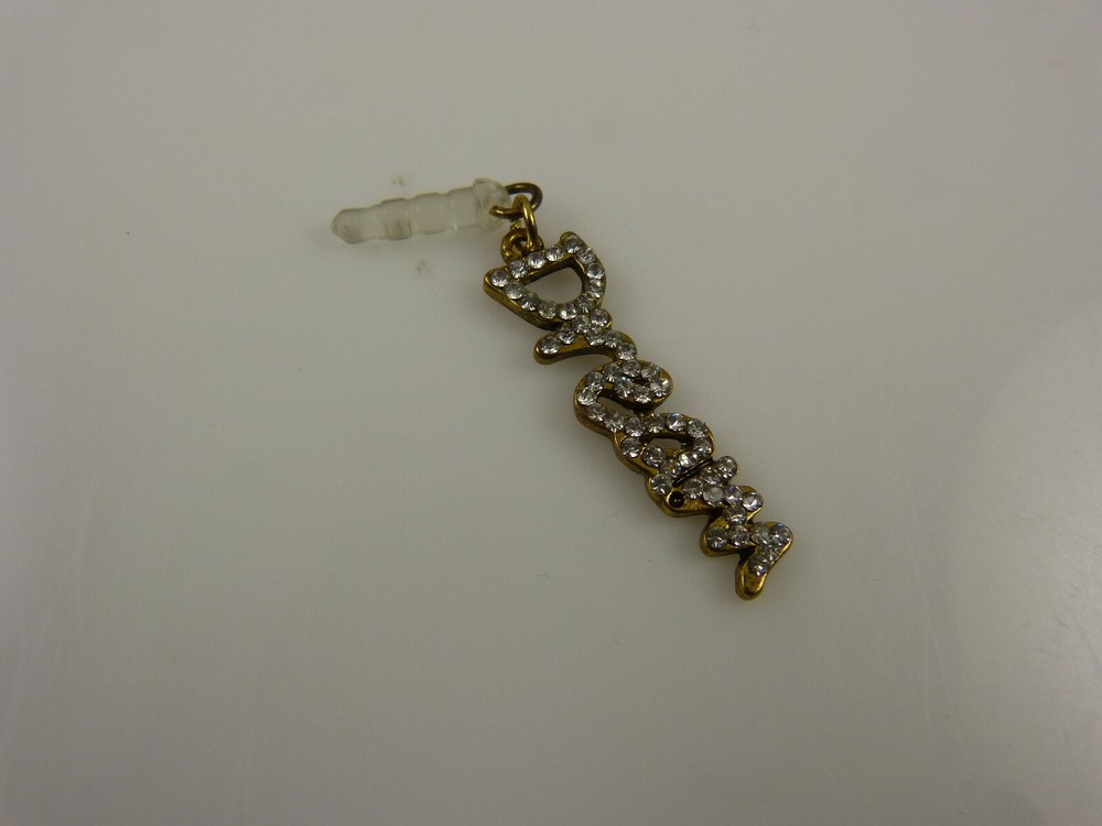 dream cell phone or Ipad charm ear cap dust plug