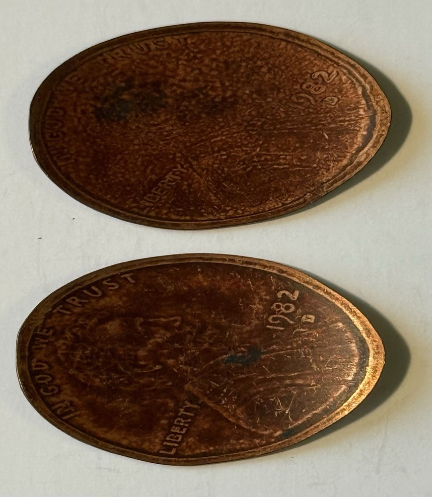 Two Smashed Elongated Copper Pennies with The Same Saying, #28