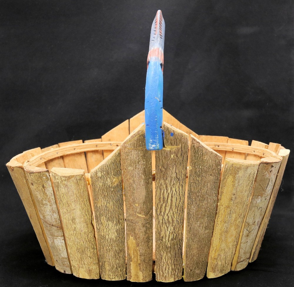 medium-sized oval storage basket features a wood fish handle