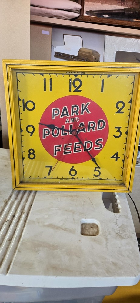 Vintage Park and Pollard Feeds Clock (yellow square clock)