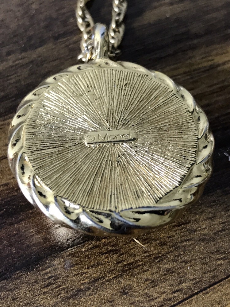 Monet Gold tone Necklace with round Pattern Pendant