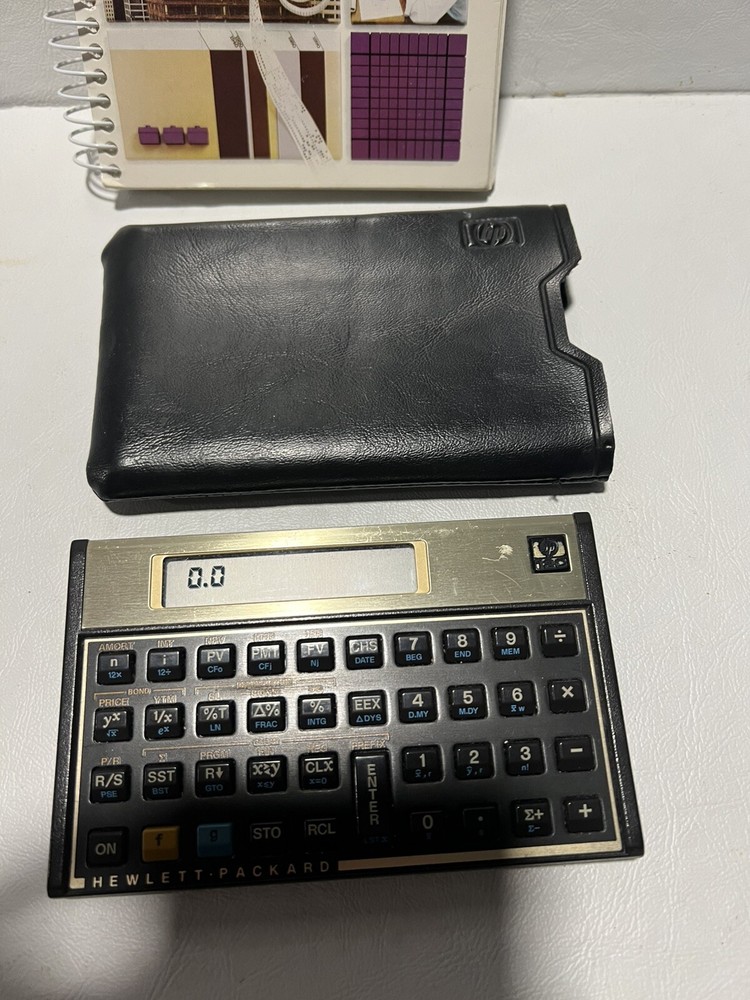 HP-12C Calculator with Case And Owner's Handbook