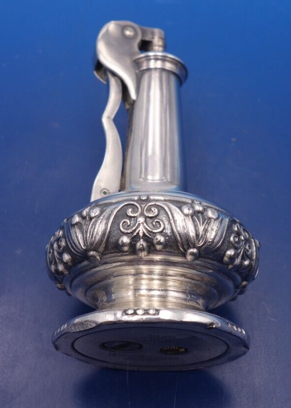 Vintage silver plate decanter lighter by Ronson