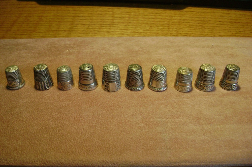 10 Antique Sterling thimbles