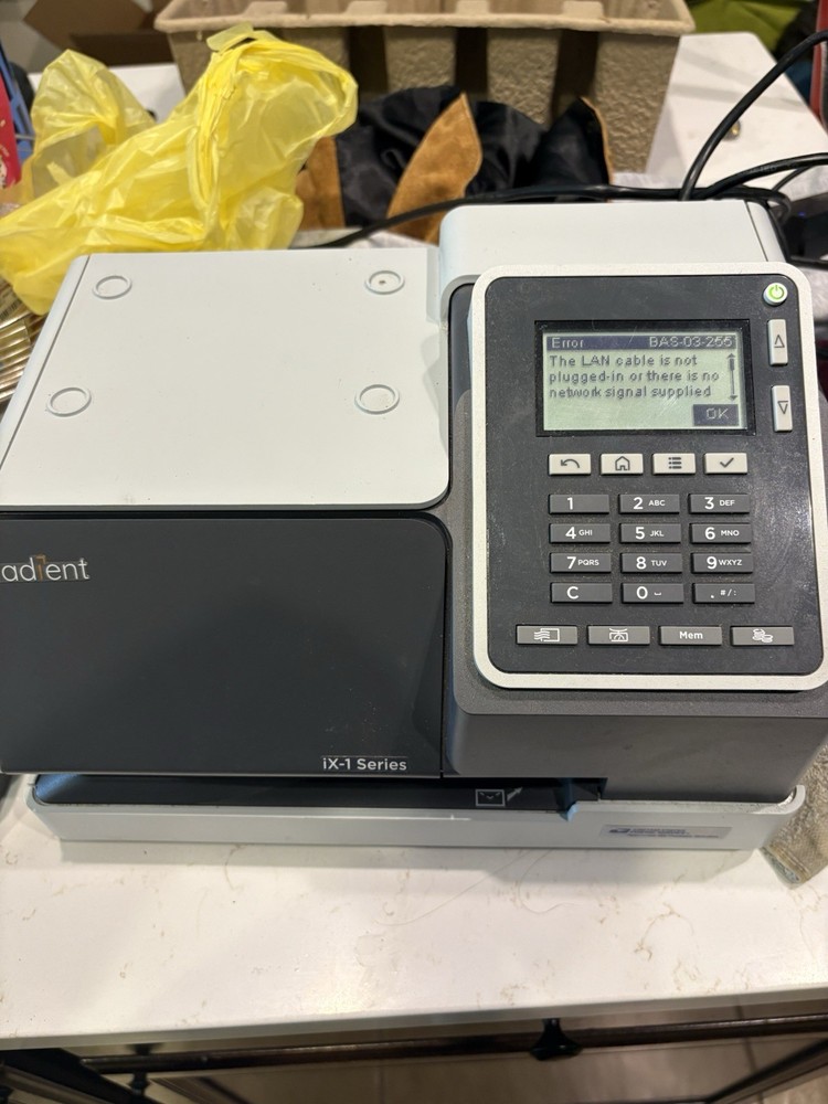 Quadient IX-1 Series Postage Printer.