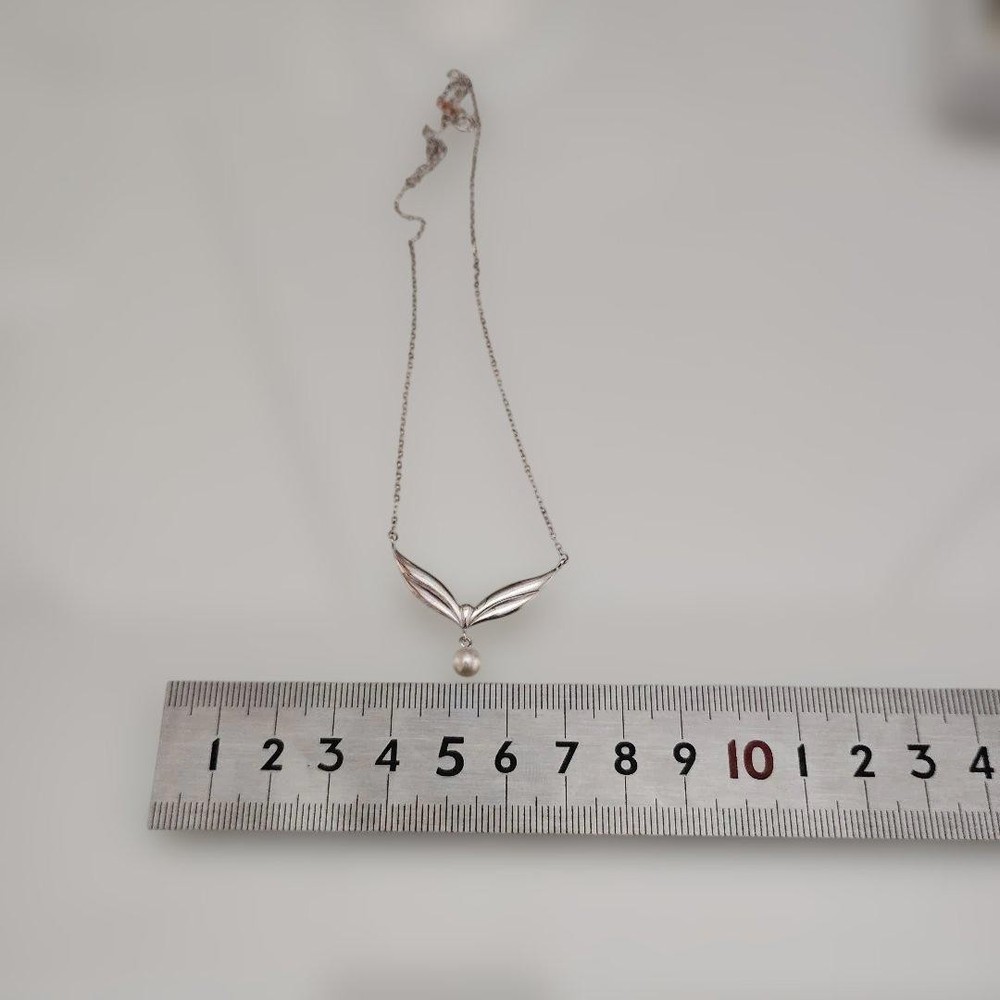 Mikimoto? Silver feather design necklace with pearls