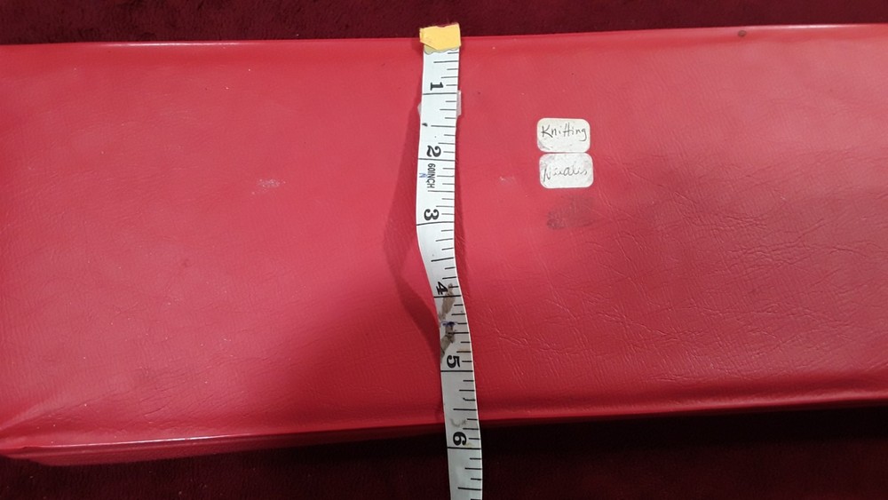 Knitting needles in zipper case