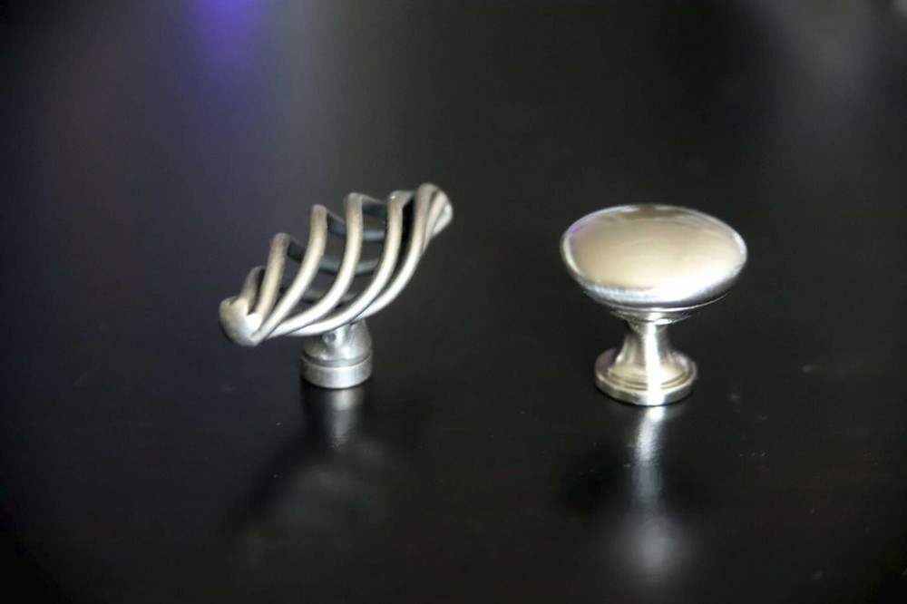 Cabinet Pulls/Knobs. Two styles in Brushed Satin. 35 total. Screws Included.