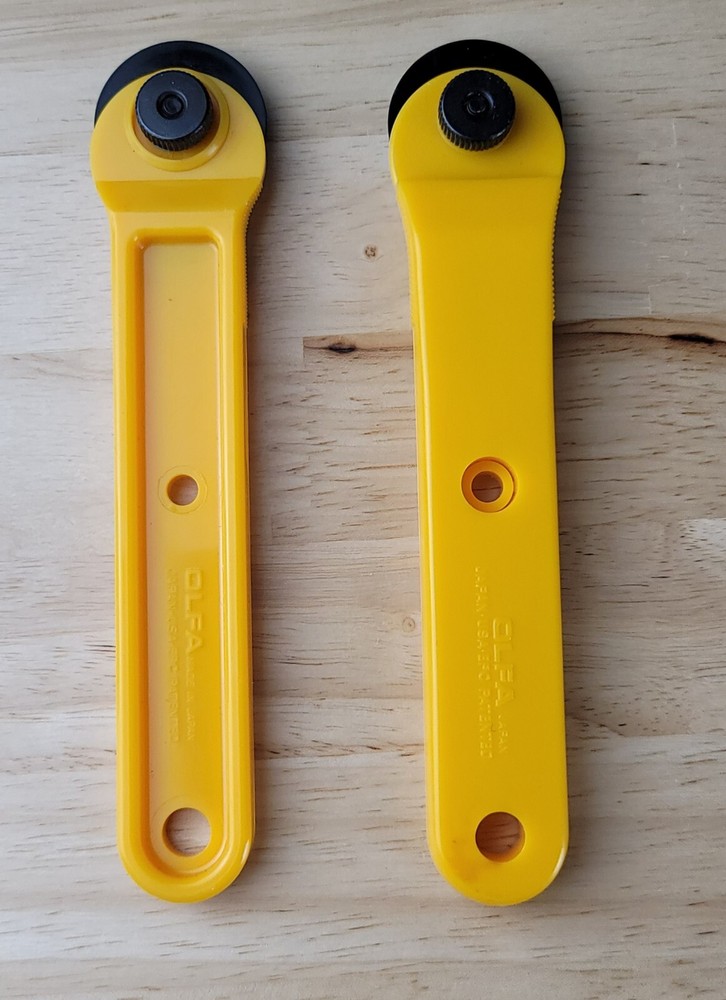 OLFA ROTARY CUTTING MAT & 2 CUTTERS