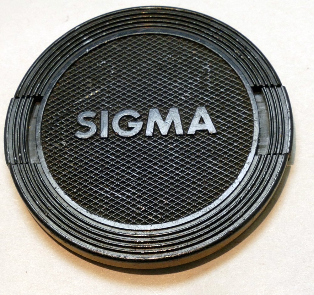Sigma 52mm lens front cap (snap on type) for 28mm mini-wide