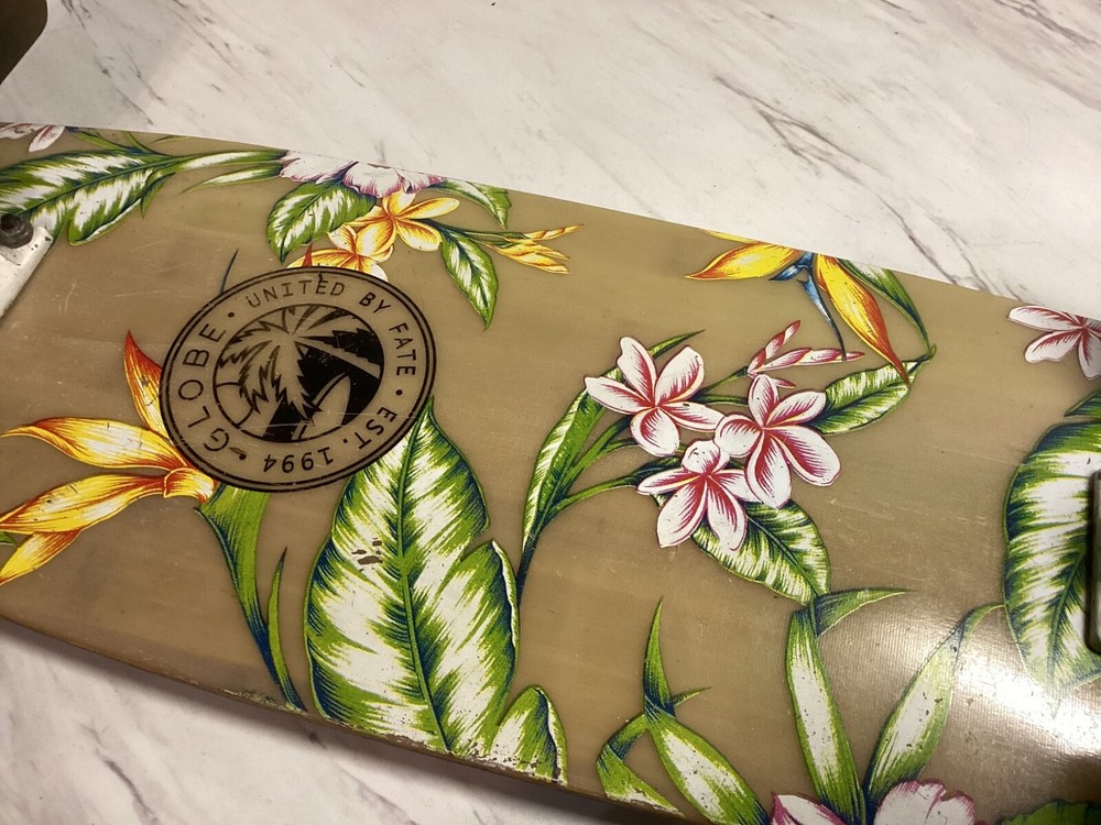 Globe Flower Graphic Complete Skateboard - 25”x7”.