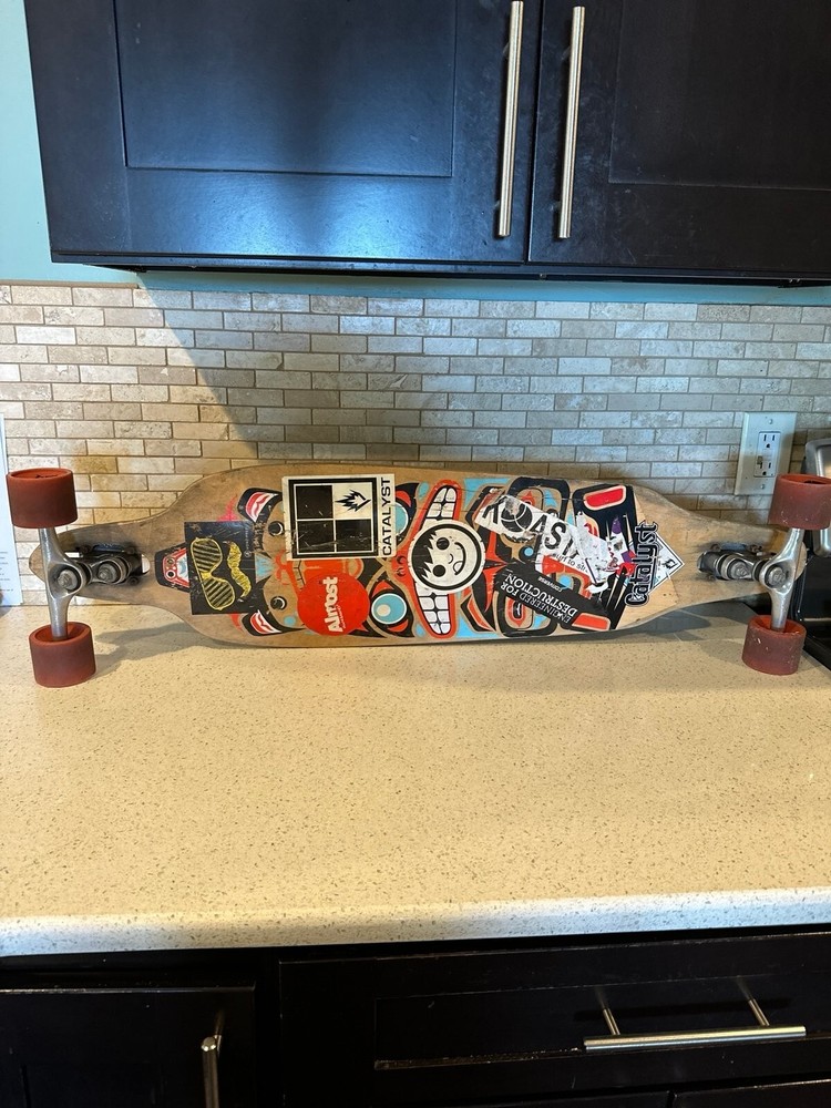 Catalyst longboard with gull wing trucks