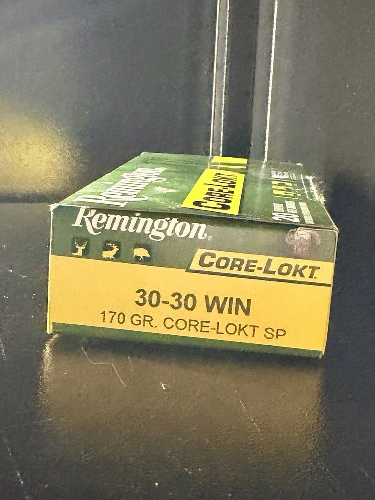 Various empty cardboard ammo boxes.