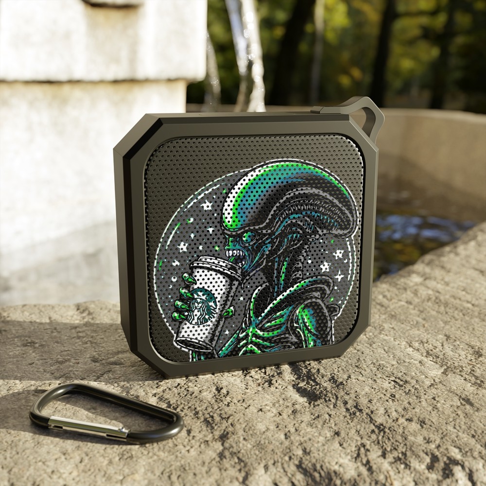Blackwater outdoor Bluetooth speaker, a fun alien drinking coffee.