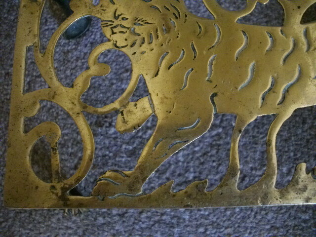 Brass trivet stand with strolling Tiger c1880