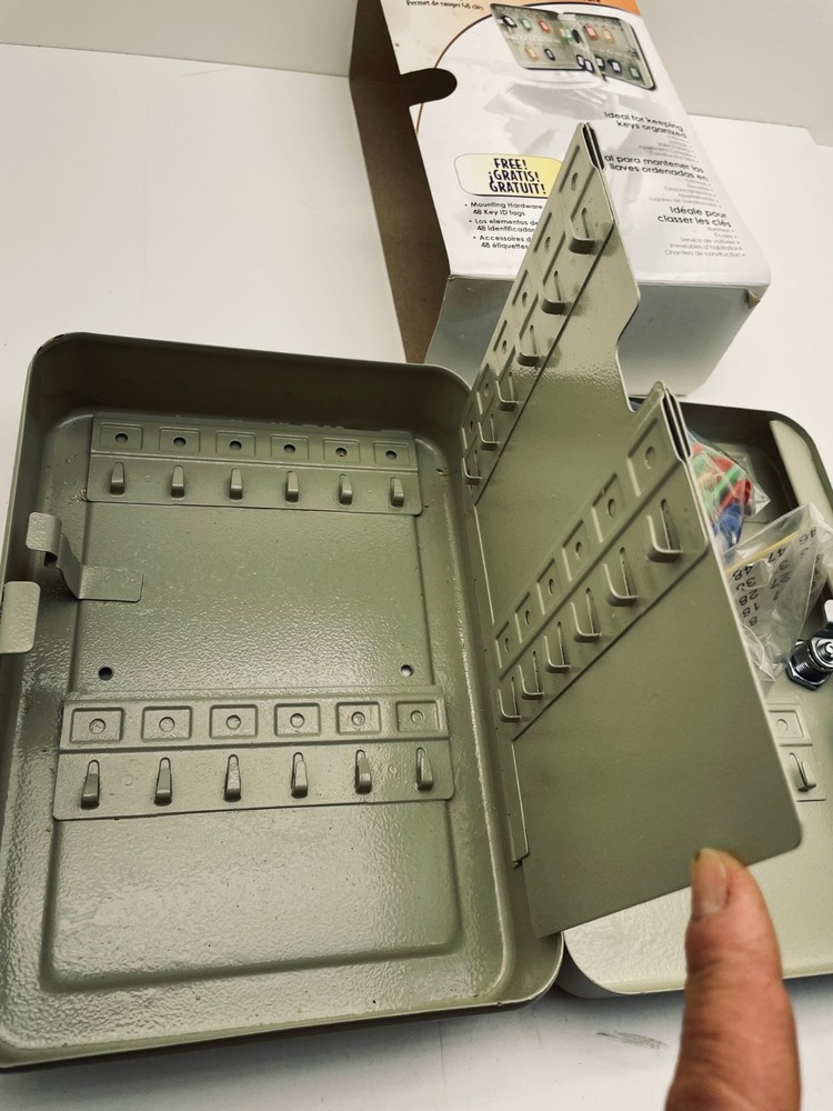 Locking key cabinet holds 48 keys