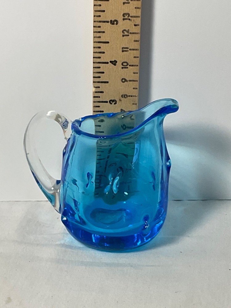 Art glass Light blue dimpled design creamer 3”