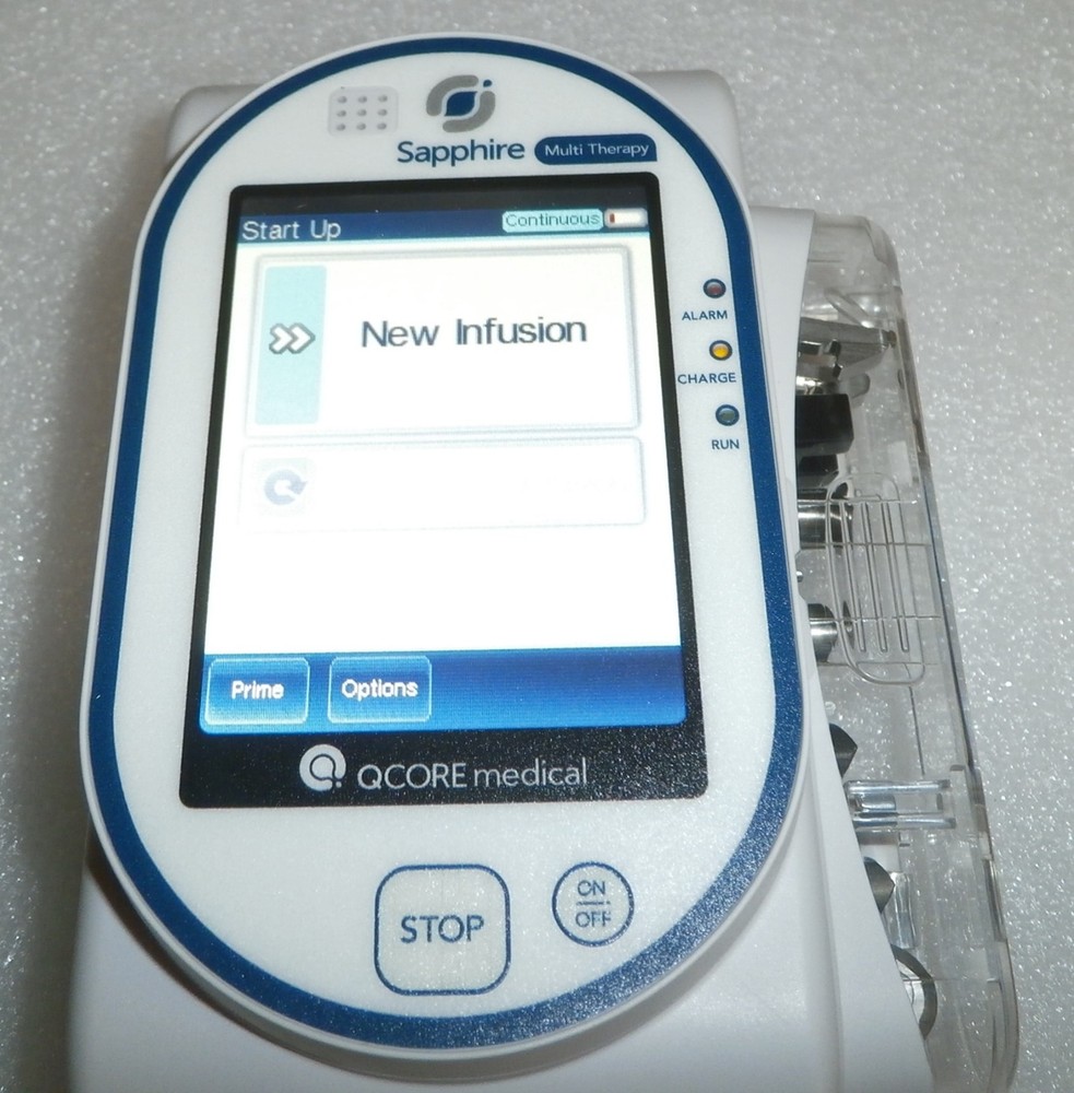 QCORE Sapphire multi therapy pump with accessories (has bad battery)