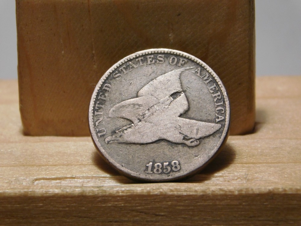 1858 Flying Eagle cent error, lamination across the center