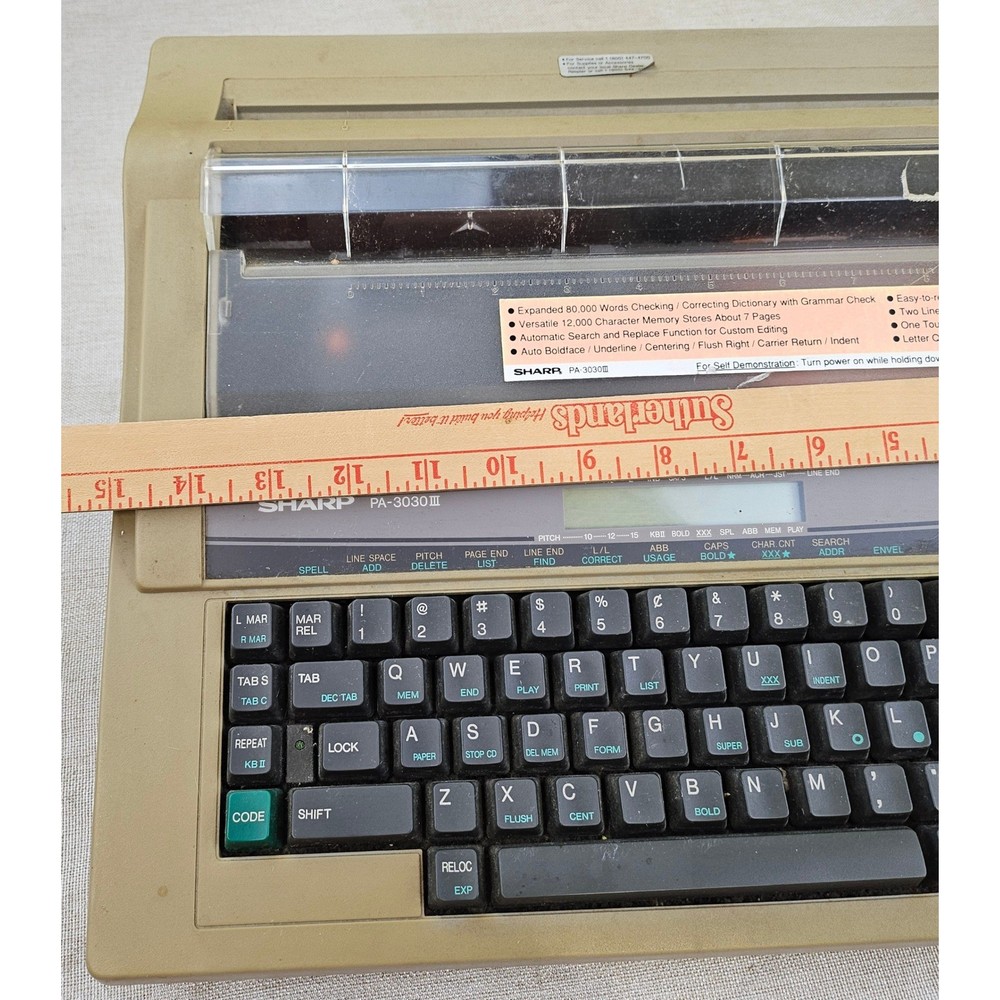 Sharp PA-3030III Electronic Typewriter with Cassette Ribbon and Correcting Tape