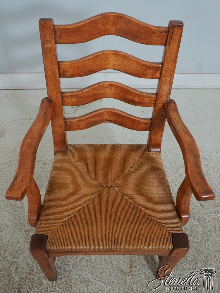 68471: Pair GUY CHADDOCK Distressed Ladderback Armchairs