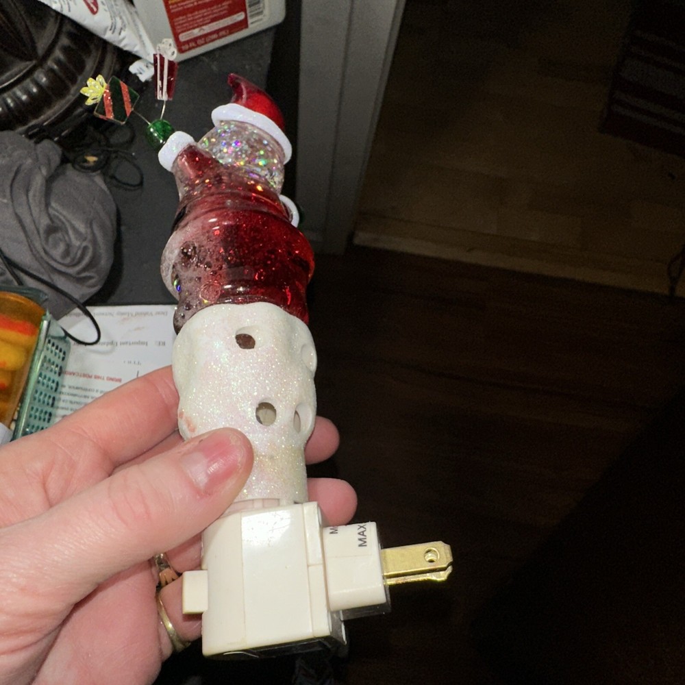 Santa night light with Jingles over his head