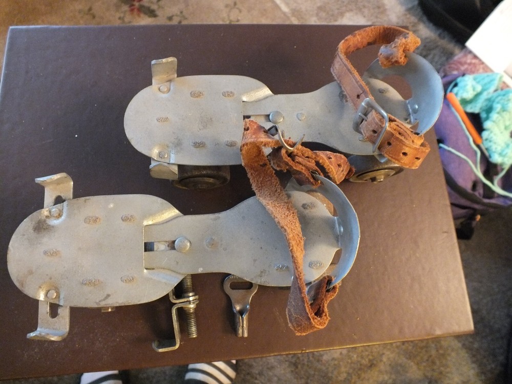 antique roller skates a pair