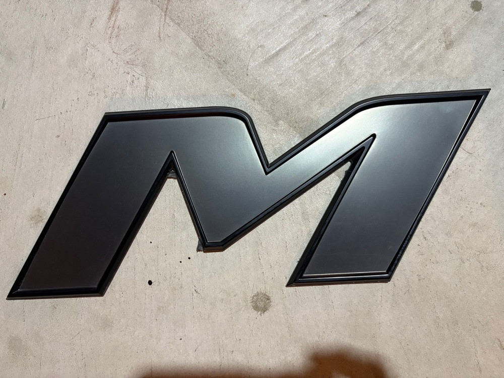 Moomba Raised Black Letters