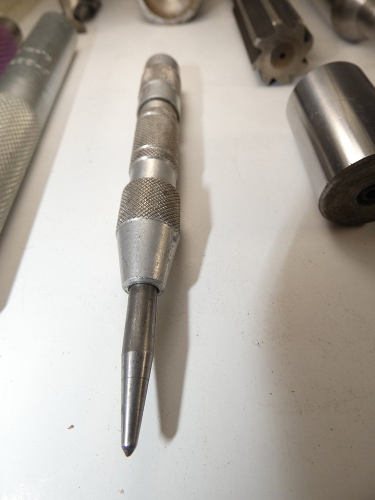 Set of eleven machinist tools, extractors, bits, etc.