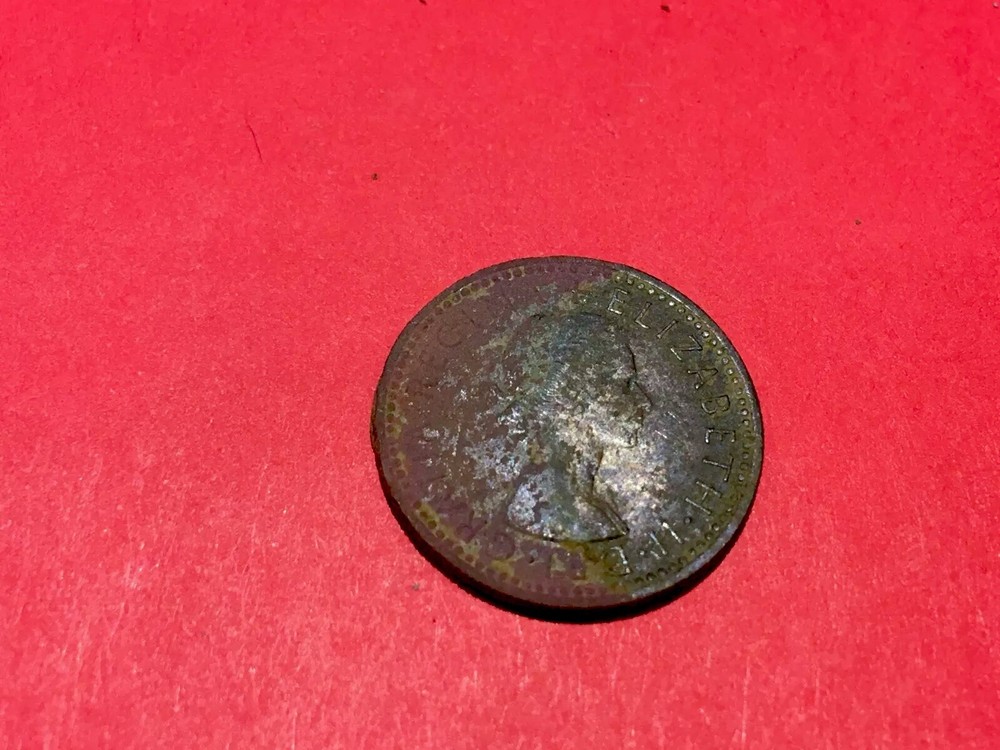 SIXPENCE 1957
