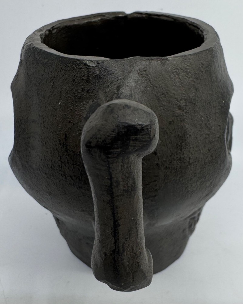 Cast Iron Skull-Shaped Bottomless Mug Thingy With Handle Both Ends And Eyes Open