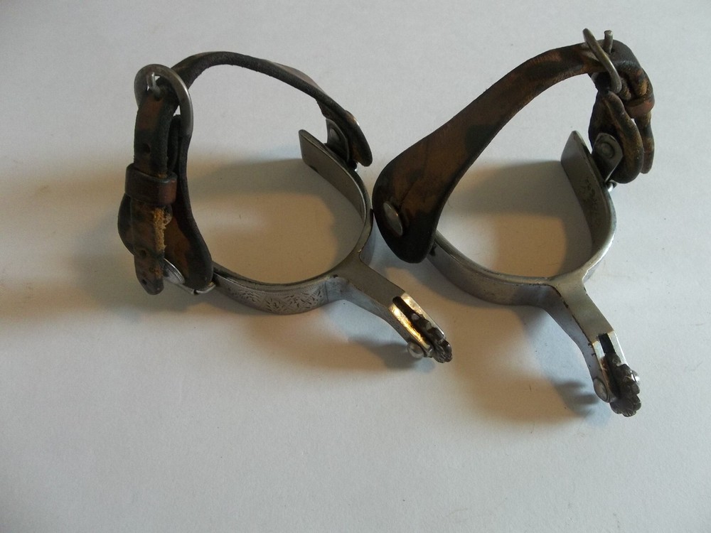 SPURS WITH DESIGN STAMPED ON SIDE #62