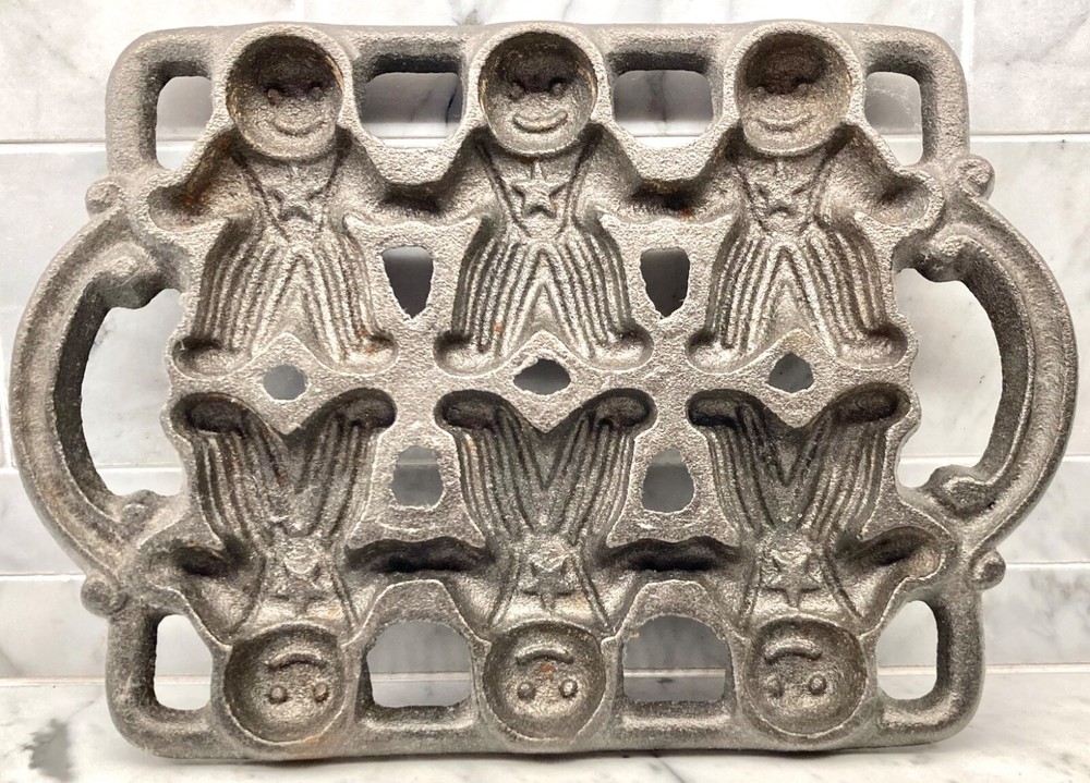 CAST IRON GINGERBREAD MAN PAN