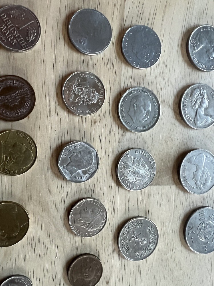 Assorted foreign coins. 26 Coins In Total