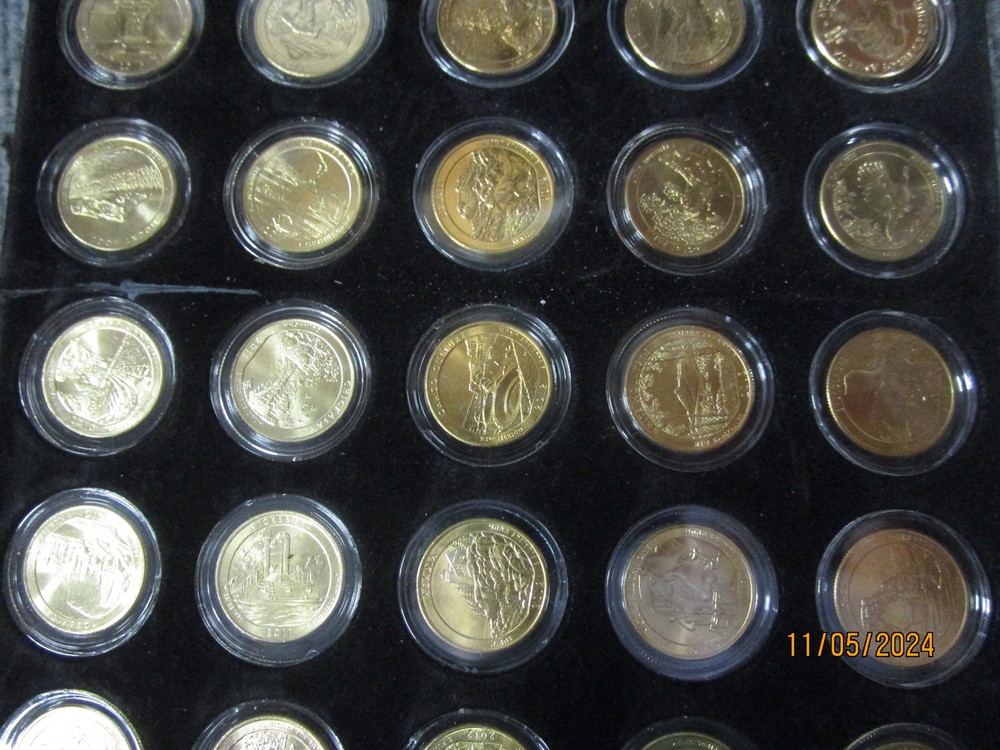 111 Uncirculated Gold State Quarters