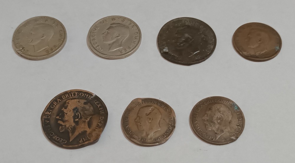 George V and George VI coins with error