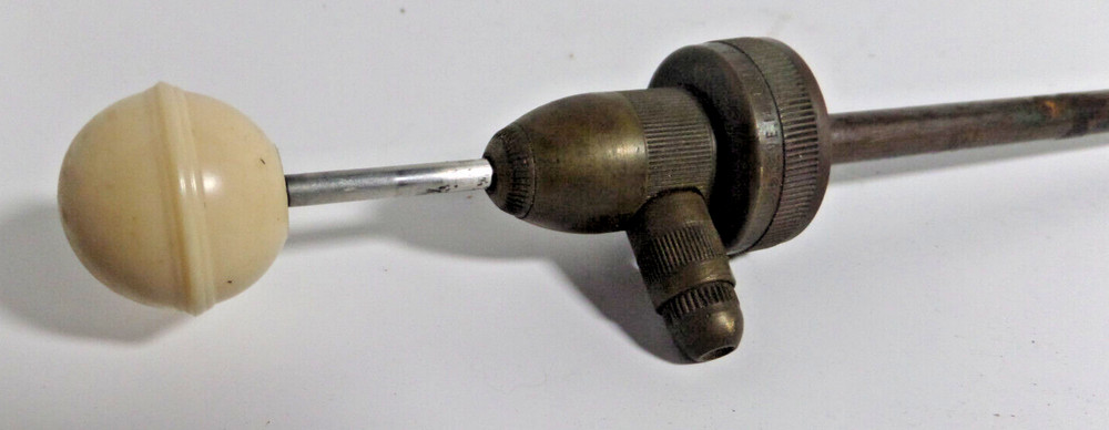 brass pump nozzle for a bottle? vintage