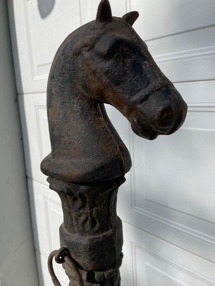Antique cast iron horse head hitching posts & chain