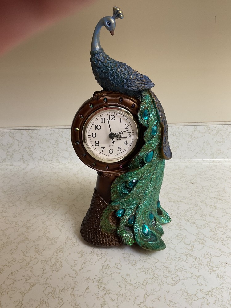 Decorative Peacock Clock originally sold by CRACKER BARREL